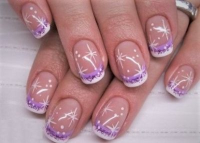 Lilac and white patterned nail design. Star patter